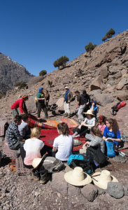 Students enjoying a picnic in the High Atlas Mountains, Morocco