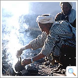 Berber preparing mint tea